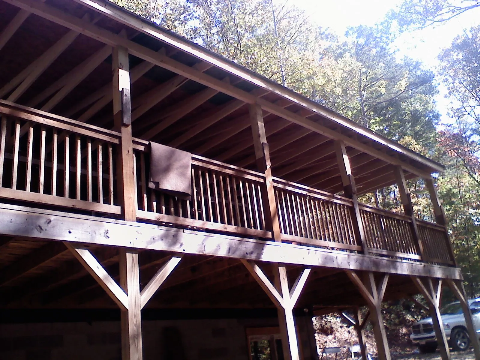 Timber framing under a new elevated porch and deck — Roof Leak Repair in Endicott by Roofing Brothers